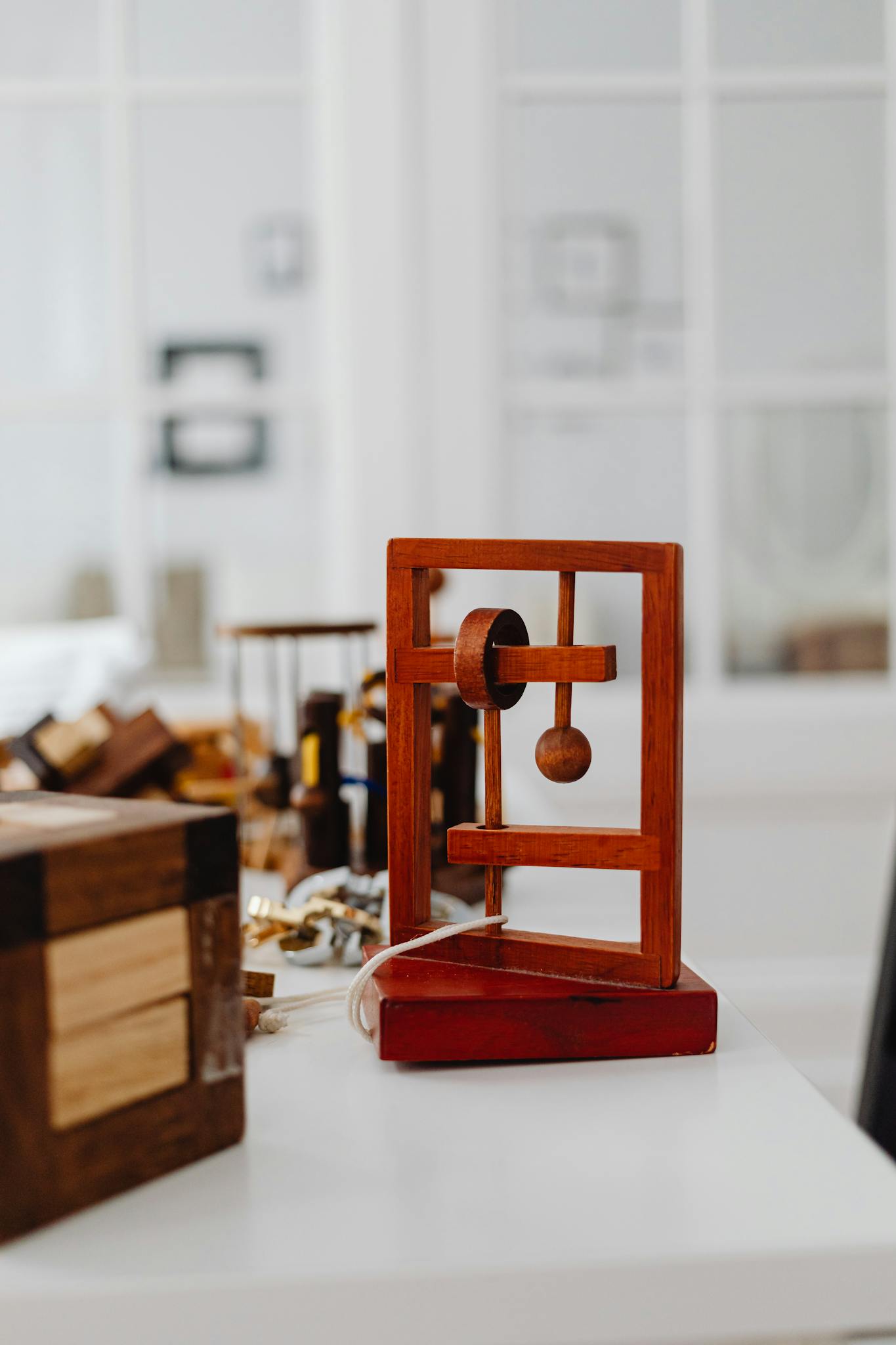 Close-up of a wooden puzzle toy on a table indoors, ideal for brain games and cognitive development.
