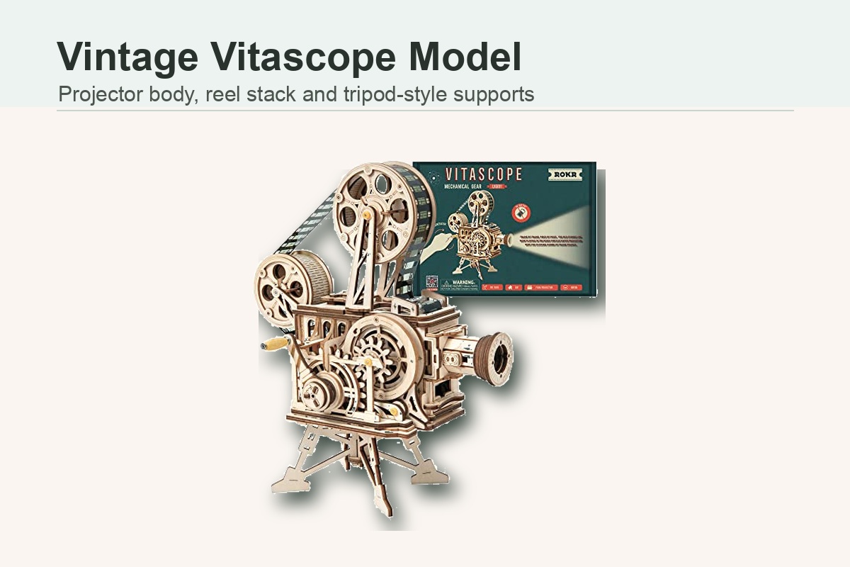 Vitascope music box product graphic showing vintage projector body, reel stack and tripod-style supports
